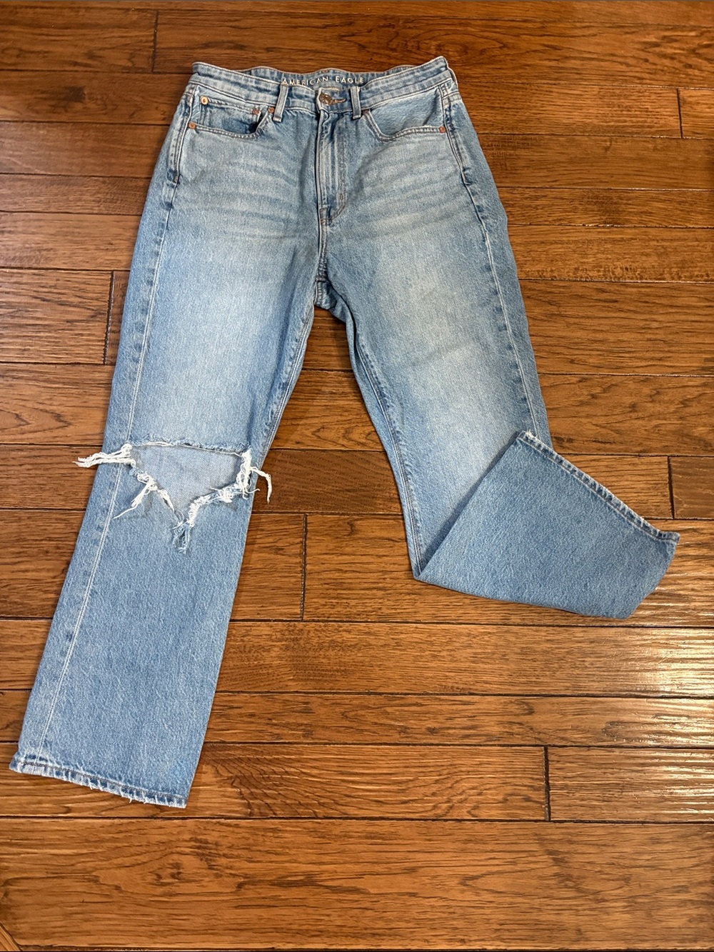 American Eagle Outfitters Light Wash Straight Leg Jeans with Knee Distress